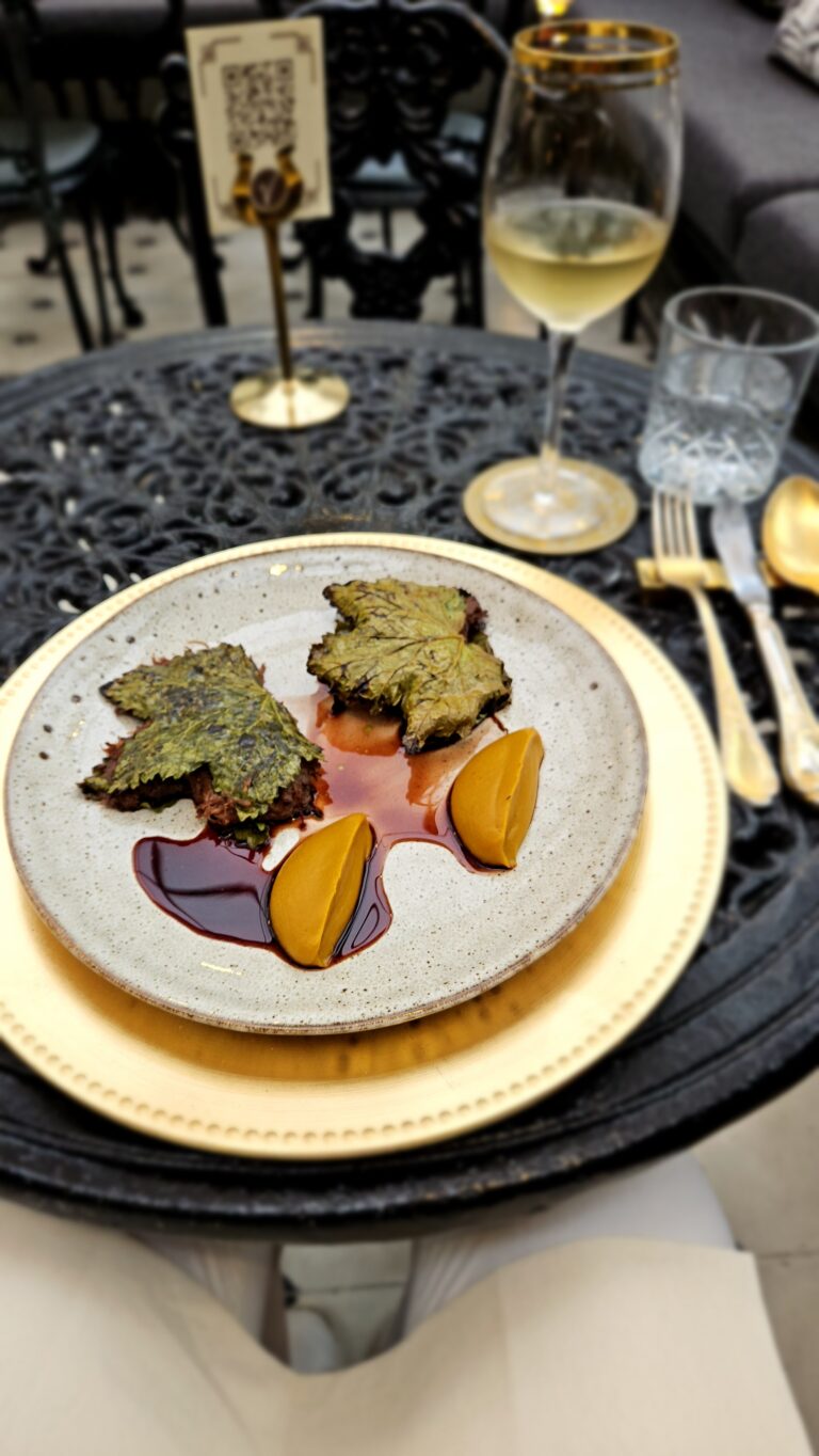 Lamb with puree of sweet potatoes and grape leaves